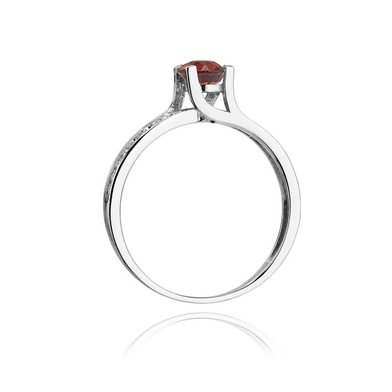Pierścionek złoty 585 z brylantami 0,03ct granatem 0,60ct W-106
