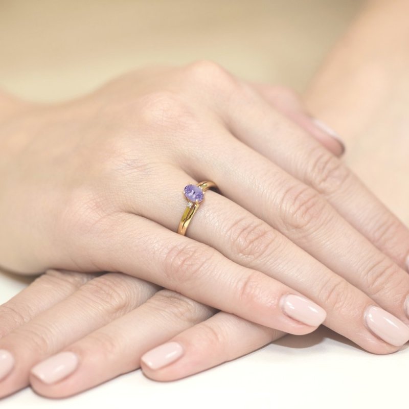 Pierścionek złoty 585 z brylantami 0,03ct tanzanitem 0,40ct W-68