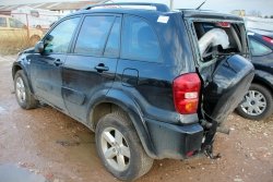 Zamek drzwi tył lewy Toyota Rav4 II XA20 Lift 2004 Suv 5-drzwi