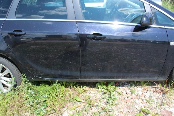 Reflektor lewy Opel Astra J 2011 Kombi
