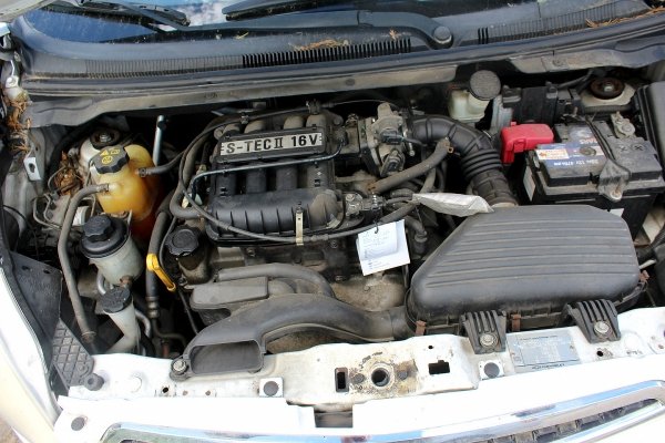 Konsola Chevrolet Spark M300 2011 1.0i B10D1 Hatchback 5-drzwi 