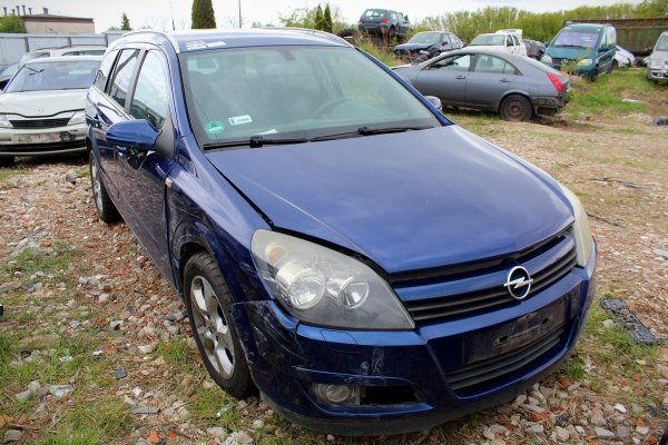 _Zamek drzwi tył lewy Opel Astra H 2005 Kombi 