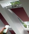 VELUX DML Premium INTEGRA® Elektro-Verdunkelungsrollo für VELUX Dachfenster, Pick&Click ®-Systems, dreilagigen Oeko-Tex®-Stoff _ house-4u.de