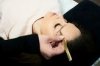 Gold tweezer with a comb for eyelashes