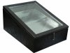 Solar wax melter with a wooden body