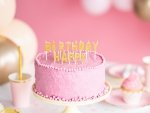 Świeczki, fontanny i toppery urodzinowe na tort