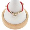 GOLDENES ARMBAND MIT EDELSTAHL