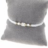 GOLDENES ARMBAND MIT EDELSTAHL