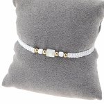 GOLDENES ARMBAND MIT EDELSTAHL