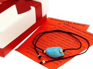 GOLDENES ARMBAND MIT EDELSTAHL