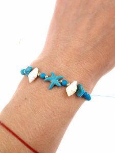 GOLDENES ARMBAND MIT EDELSTAHL