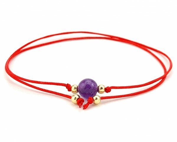 GOLDENES ARMBAND MIT EDELSTAHL