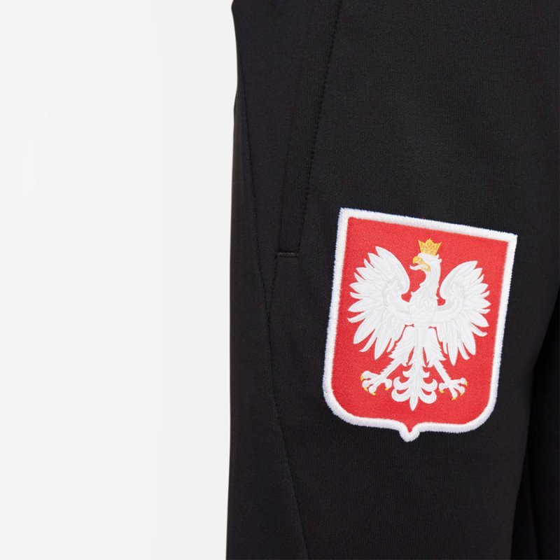 Spodnie Nike Polska Strike Jr DM9600 010 czarny M (137-147cm)