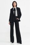 Nife Spodnie bootcut, z krytym guzikiem - czarny - SD101
