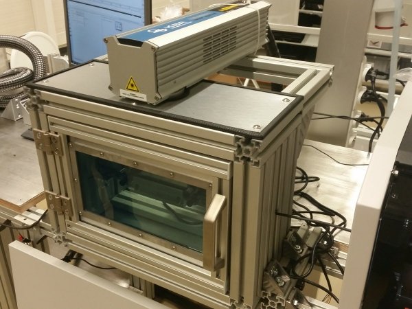 Laser cabinet for the use in cable marking