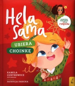 Hela sama Ubiera choinkę