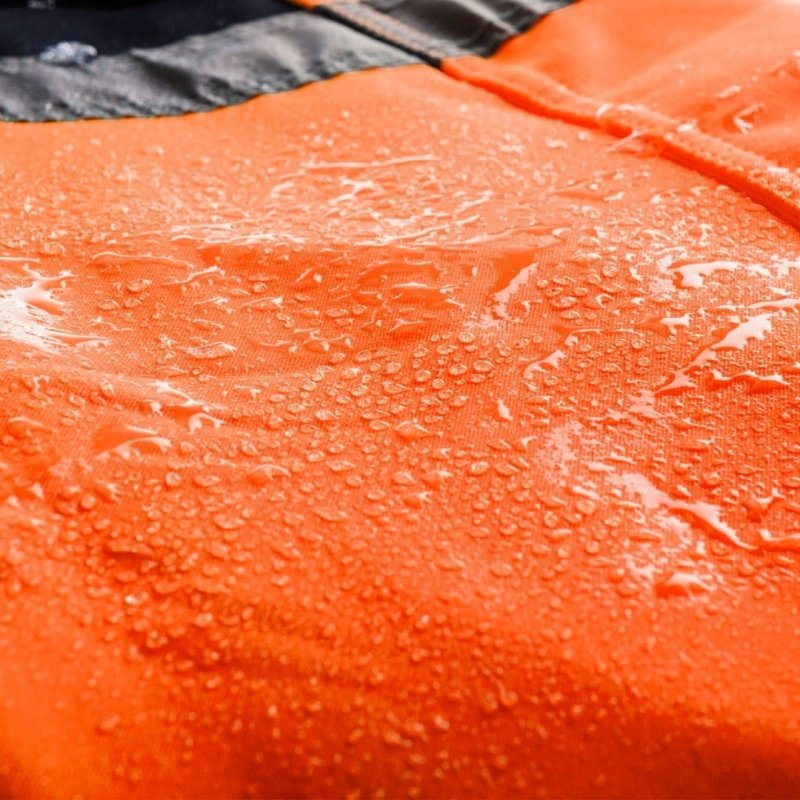 Spodnie robocze ostrzegawcze SOFTSHELL pomarańczowe XL NEO