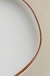 Zestaw 4 płaskich talerzy Bremen z porcelany w pastelowych kolorach i stylu boho, o nieregularnych kształtach. Idealny do nowoczesnych i naturalnych aranżacji stołu.