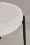 Krzesło do jadalni Anisa z tkaniny bouclé i metalowymi nogami, idealne do nowoczesnych wnętrz.