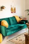 3-osobowa sofa do salonu rozkładana z funkcją spania z zielonego aksamitu na metalowych nóżkach