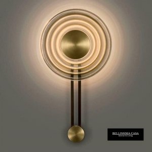 Designerska nowoczesna lampa ścienna kinkiet w kolorze złoto-bursztynowym