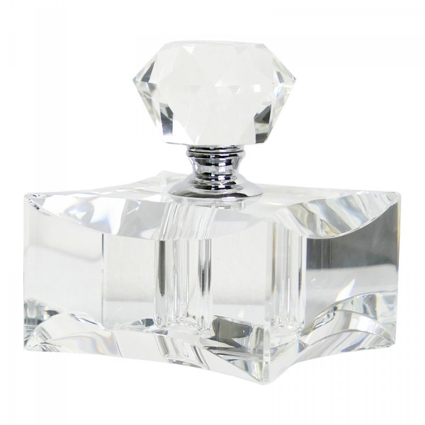 Bardzo elegancki, o wyjątkowym kształcie kryształowy flakonik na perfumy.  