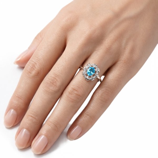 Pierścionek z naturalnym błękitnym topazem srebro 925 ROD