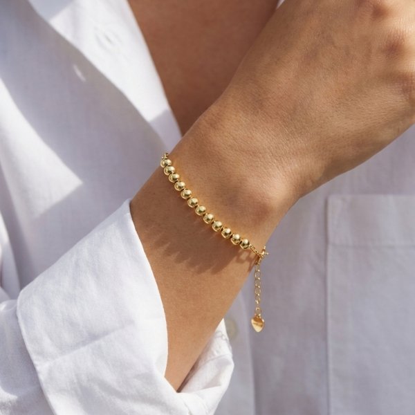 Bransoletka gładkie kule polerowane 19cm złoto 585 