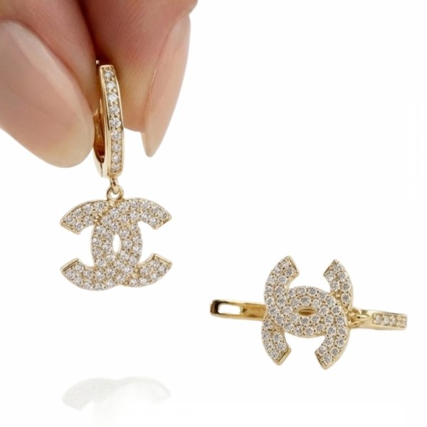 Wiszące kolczyki literki z kamieniami złoto 585