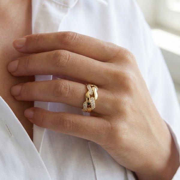 Pierścionek warkocz cyrkonie R. 14 złoto 585 