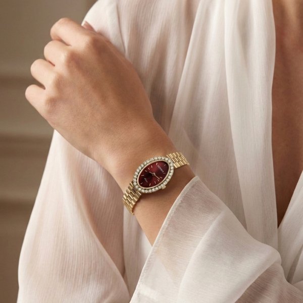 Zegarek z tarczą w kolorze rubinowym i kamieniami złoto 585 