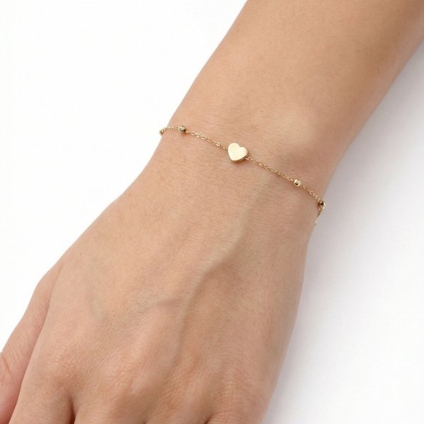 Bransoletka z sercem i kulami diamentowanymi złoto 585