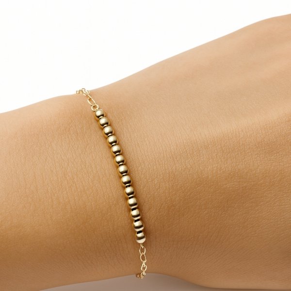 Bransoletka gładkie kule polerowane 19cm złoto 585 