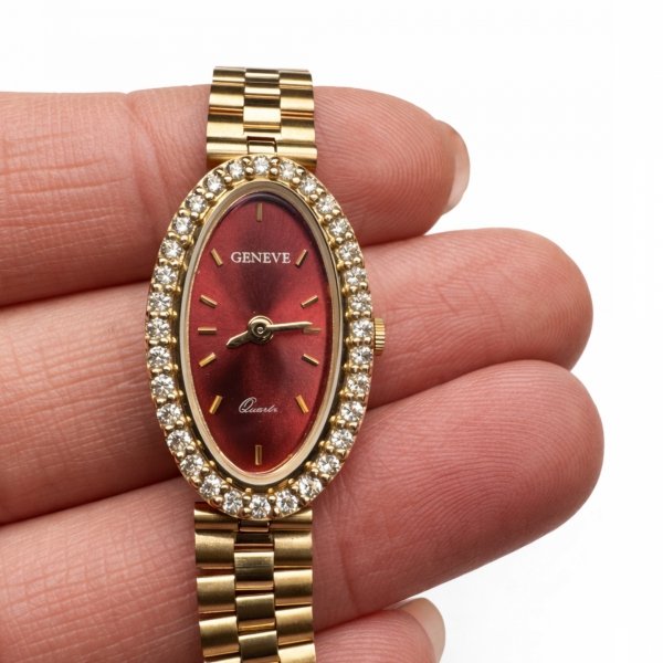 Zegarek z tarczą w kolorze rubinowym i kamieniami złoto 585 