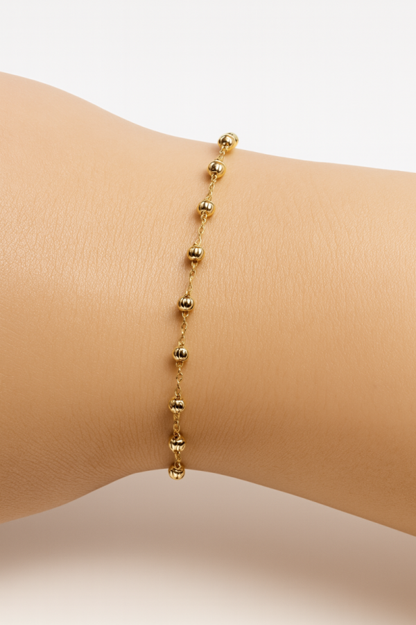 Bransoletka grawerowane kule złoto 375