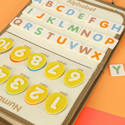 Tablica manipulacyjna sensoryczna montessori walizka dinozaury