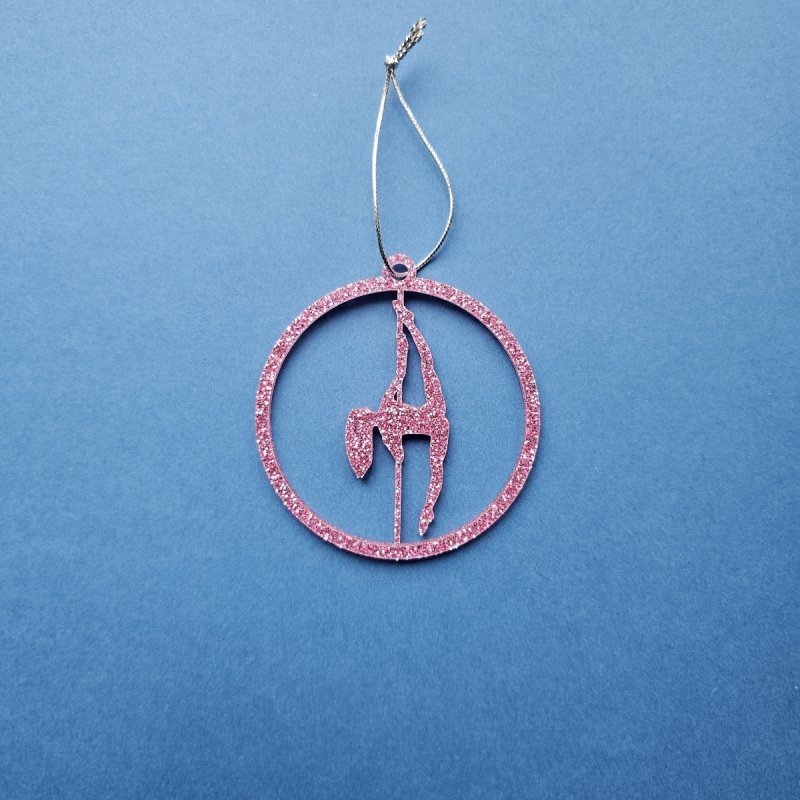 Pink Glitter Pole Dance Ornament Pose 1. Close-up of shiny plexi material