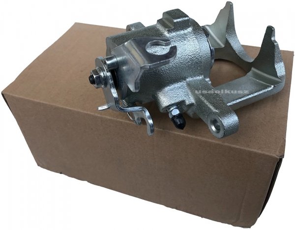Zacisk hamulcowy tylny prawy tarcze 305mm RAM Cargo Van 2012-