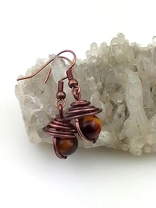 Kolczyki z tygrysim okiem dla obracających pieniędzmi