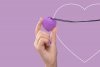 Wibrujący naszyjnik serduszko do masażu łechtaczki i sutków PleasureStone violet