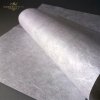 Very thin and light - only about 30-35 g/m2, semi-transparent, naturally white. It contains typical, clearly visible fibers of irregular gauge, arranged in all directions all over the paper surface, giving it an original look and structure