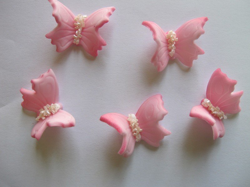 Motylki cukrowe na tort średnie różowe 3D 5szt