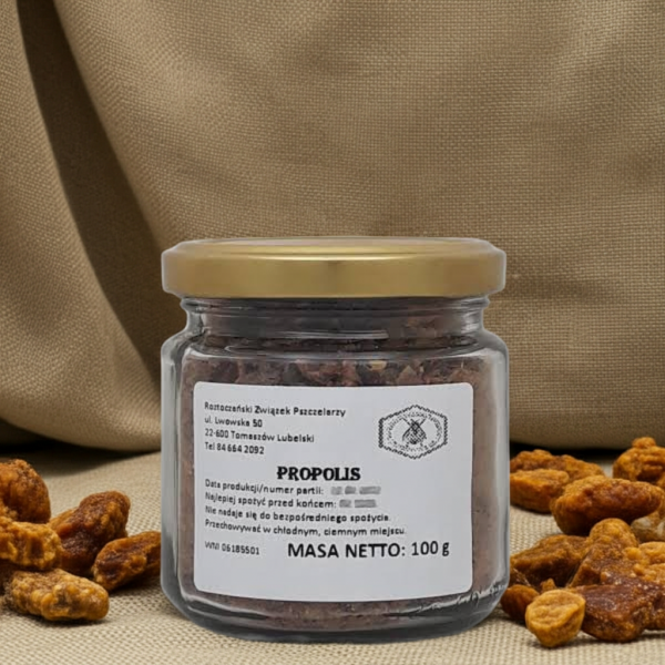 propolis słoik 100 g na tle płótna